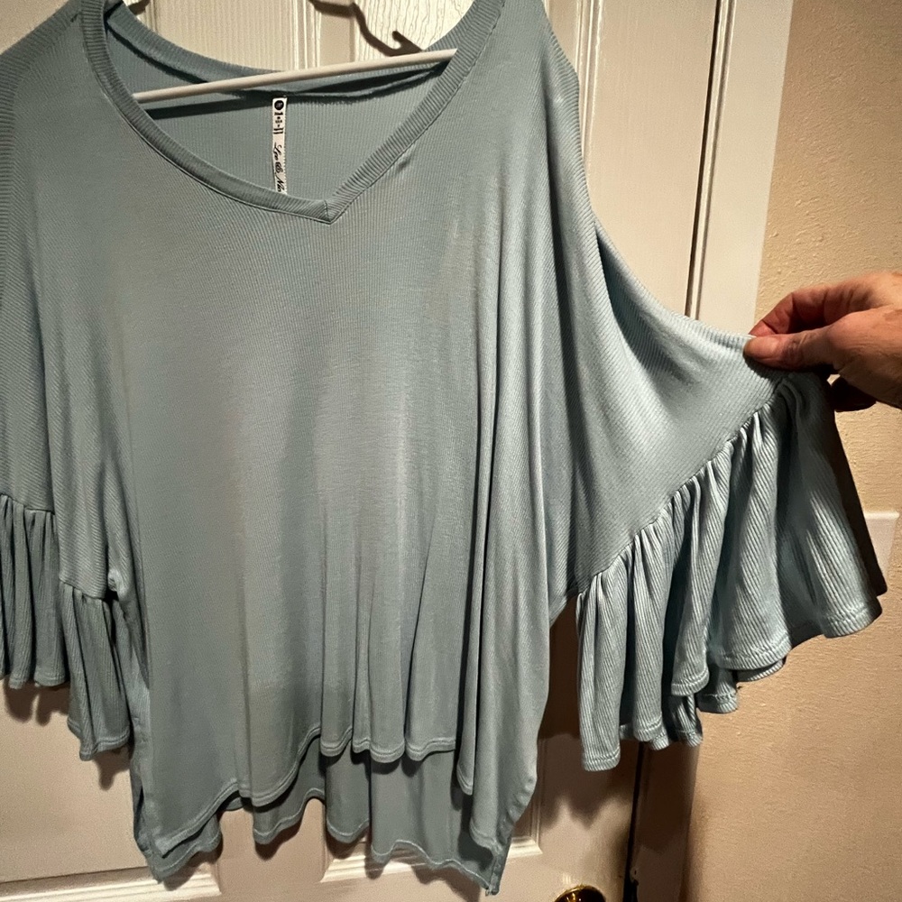 Leo & Nicole medium light blue. Worn once-twice only. Like new